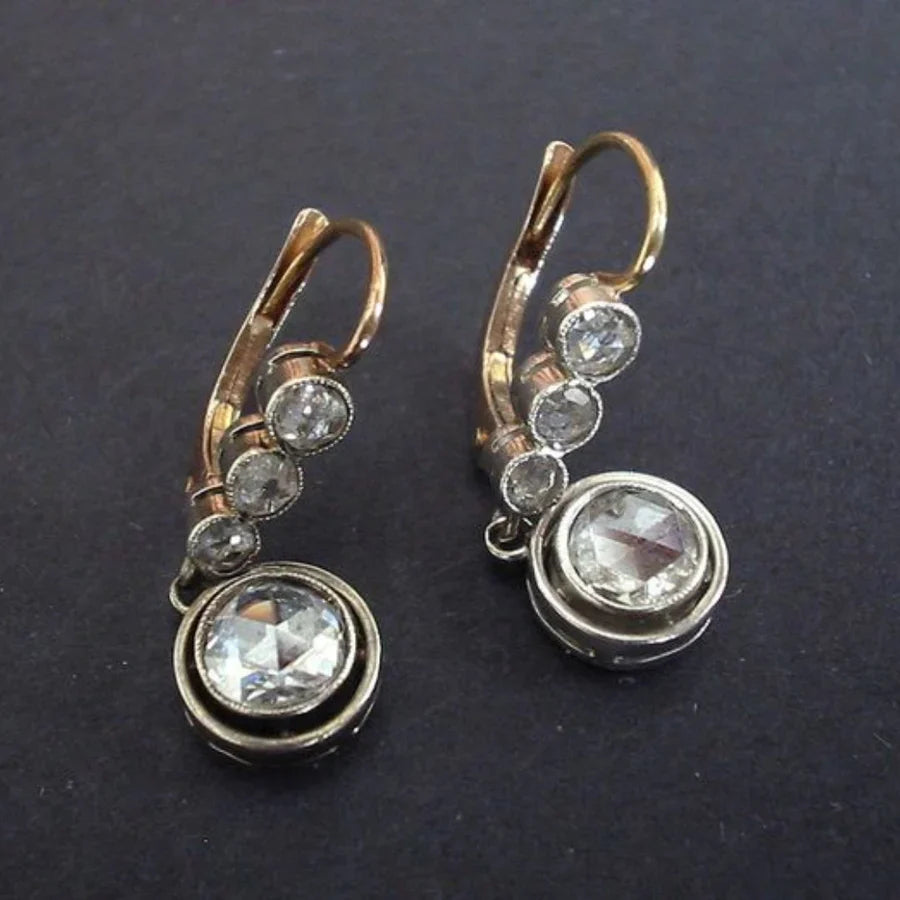 Sleek Zirconia Golden Earrings