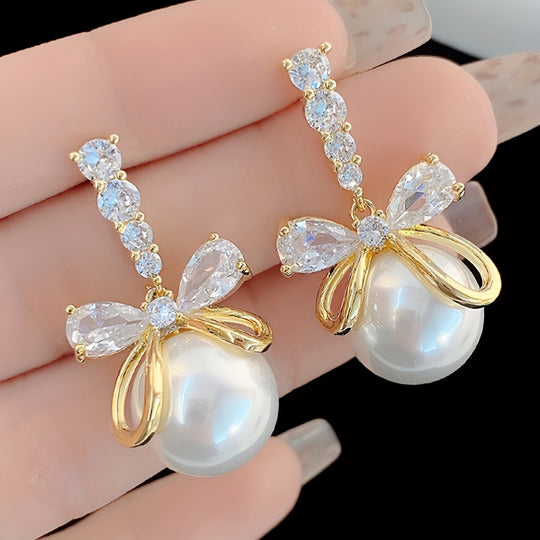 Stylish Imitation Pearl Bow Earrings