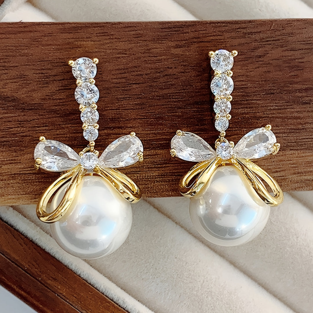 Stylish Imitation Pearl Bow Earrings