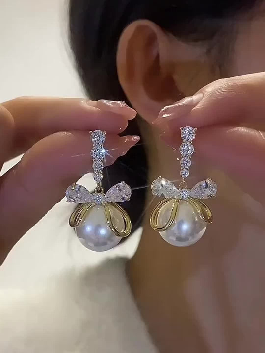 Stylish Imitation Pearl Bow Earrings