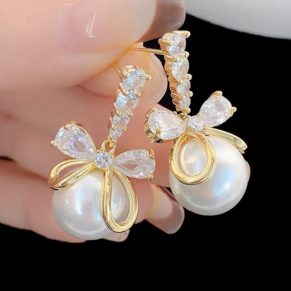 Stylish Imitation Pearl Bow Earrings